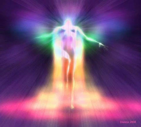 A figure moving toward an open field of light